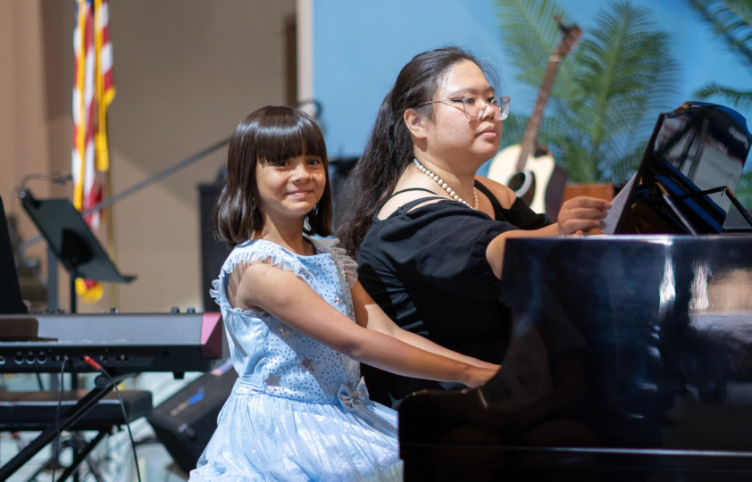 Piano student performing