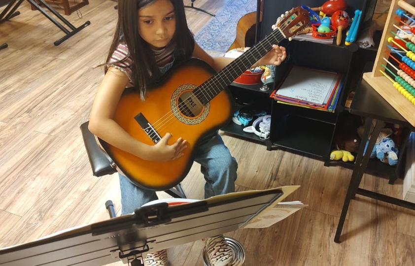 Young Guitar Student
